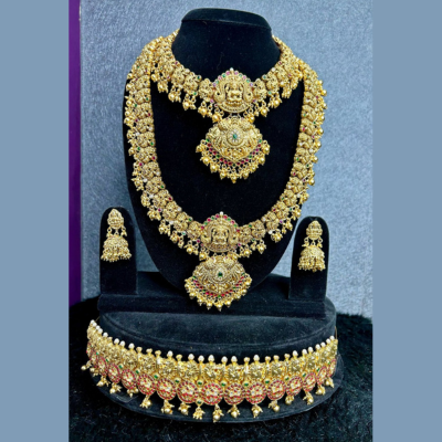 Antique Lakshmi bridal jewellery with emerald stones