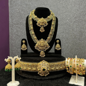 Exclusive antique bridal jewellery embedded with emerald stones